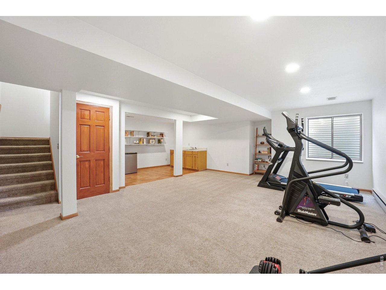 2204 Brixton Road Fort Collins, CO 80526 - Photo 27 of 42 Finished basement area, with wet bar