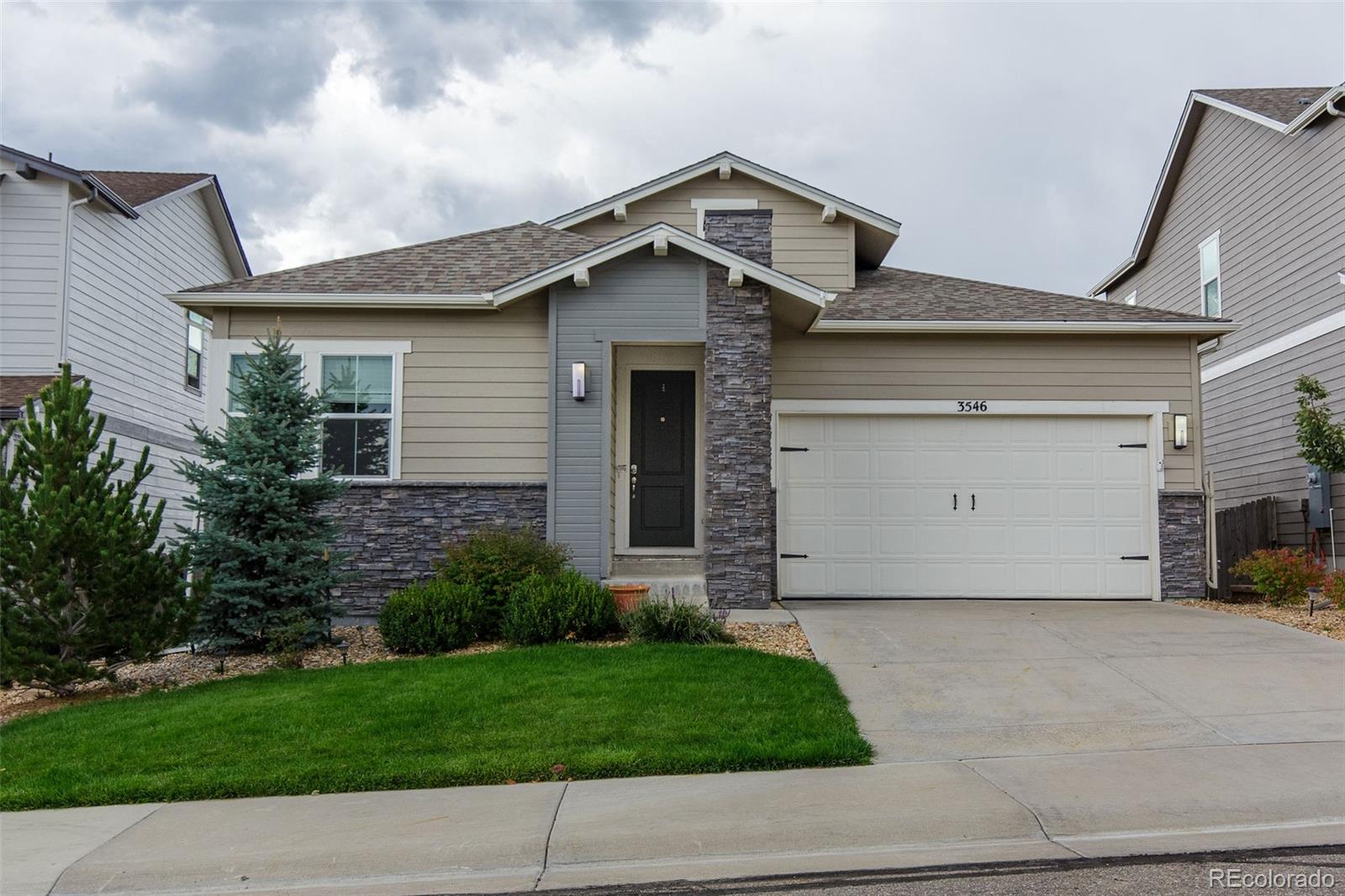 3546 Ghost Dance Drive Castle Rock, CO 80108 - Photo 1 of 36 a small white house with a outdoor space