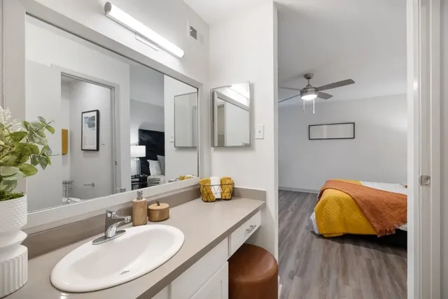 a bathroom with a toilet and a sink