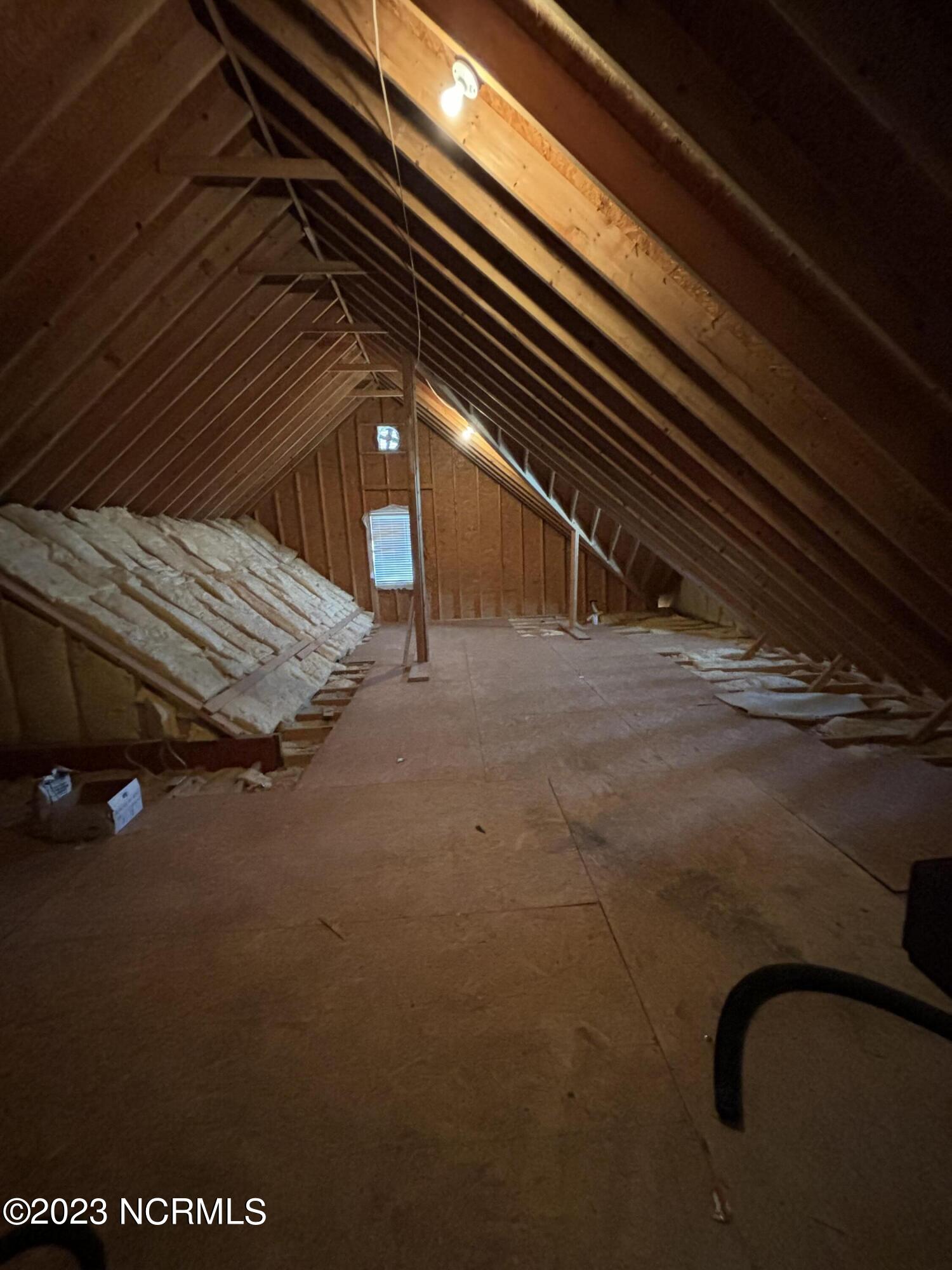 5959 Countryside Road Wilson, NC 27896 - Photo 17 of 17 Partially floored attic