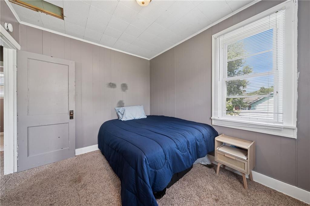 715 1/2 Armstrong, Unit 1/2 Apollo, PA 15613 - Photo 15 of 20 a bedroom with a bed and a window