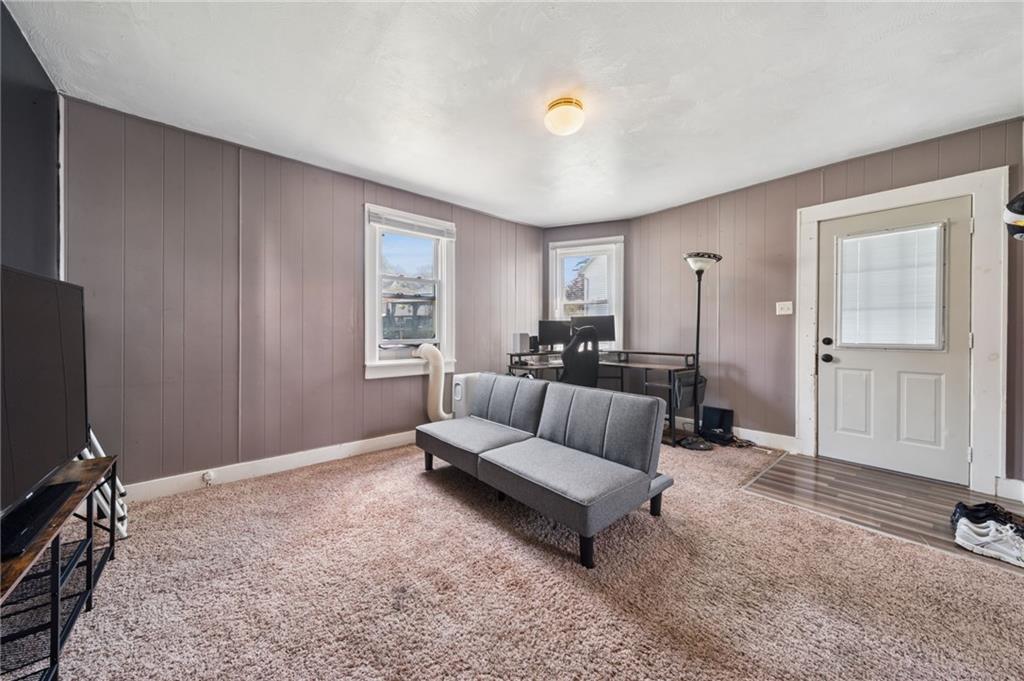 715 1/2 Armstrong, Unit 1/2 Apollo, PA 15613 - Photo 5 of 20 a living room with furniture and a flat screen tv