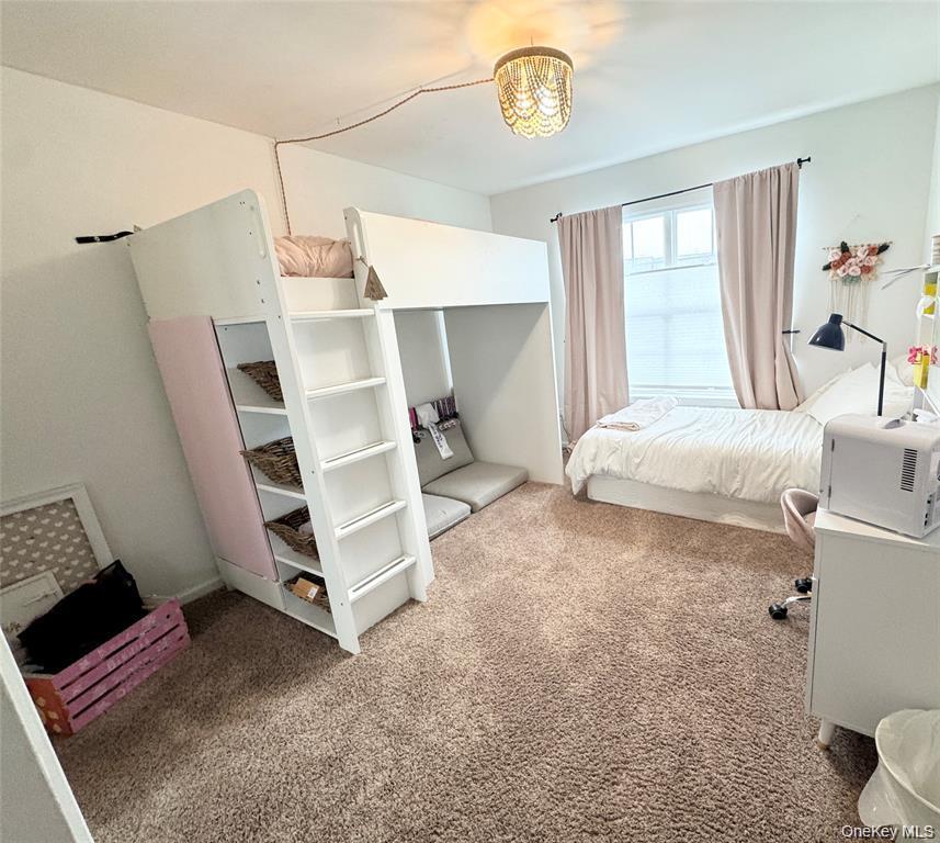 5 Case Court Monroe, NY 10950 - Photo 18 of 35 a bedroom with a bed and a window