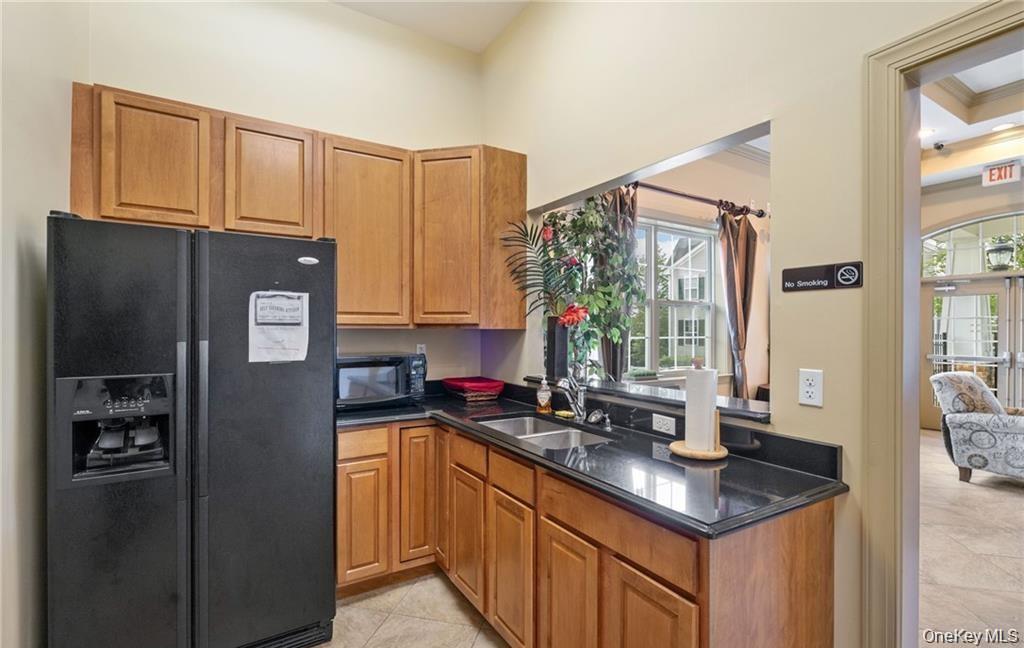 5 Case Court Monroe, NY 10950 - Photo 31 of 35 a kitchen with stainless steel appliances granite countertop a refrigerator and a sink