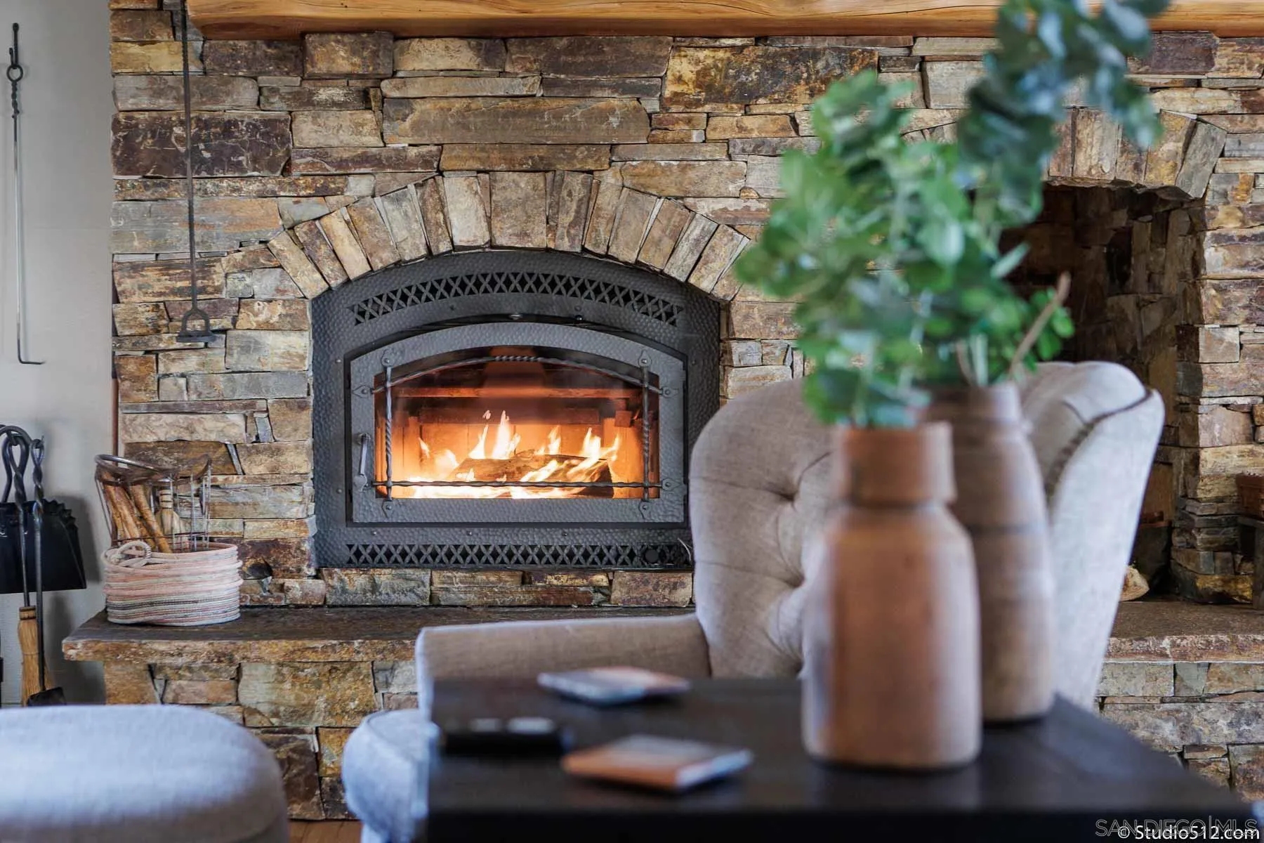 3208 Eagle Peak Road Julian, CA 92036 - Photo 25 of 65 a living room with furniture and a fireplace