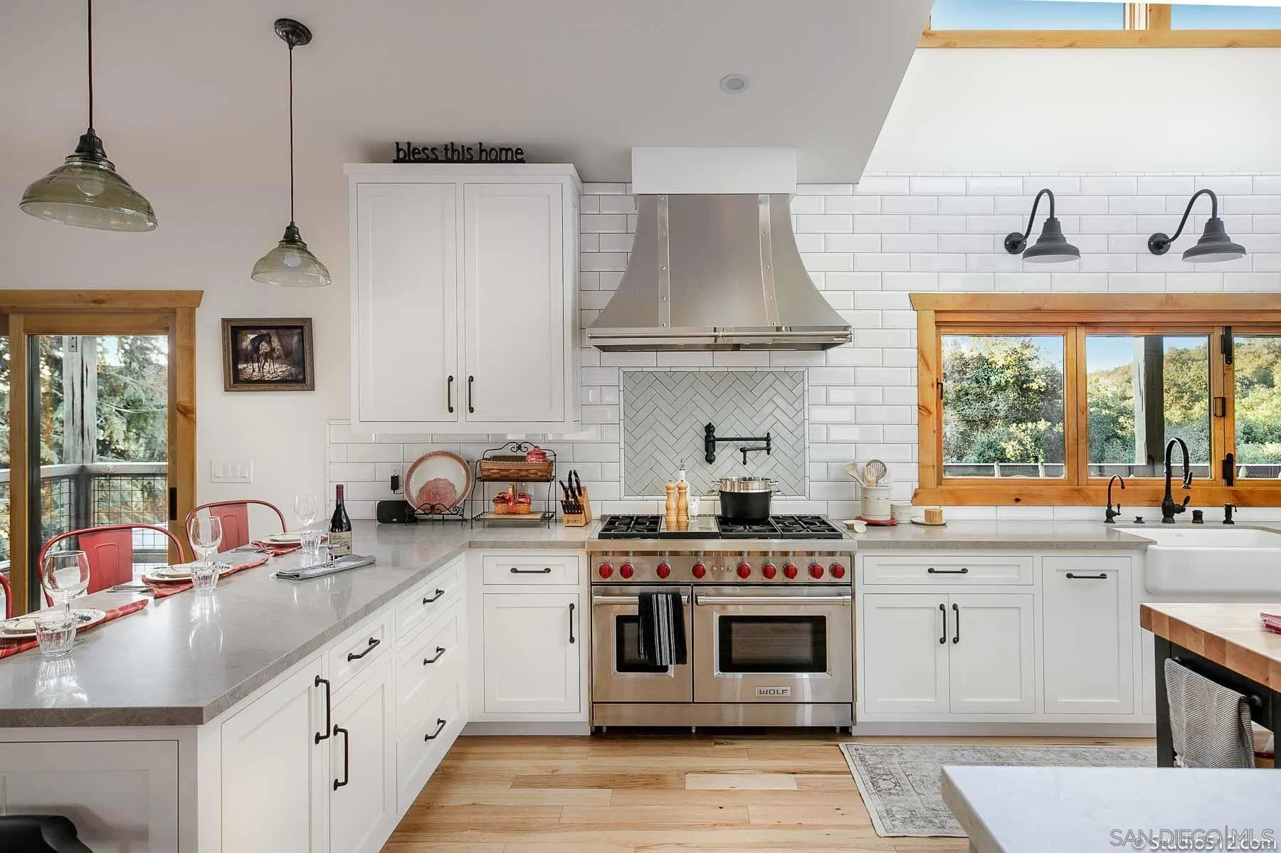 3208 Eagle Peak Road Julian, CA 92036 - Photo 30 of 65 a kitchen with stainless steel appliances a stove a sink a stove and a window