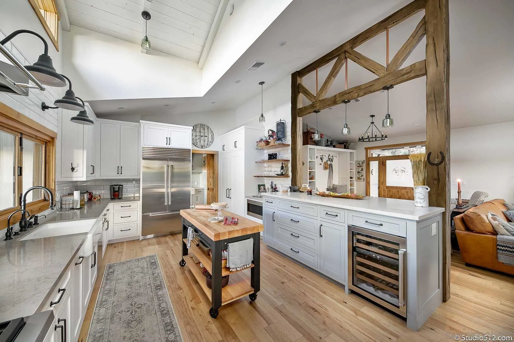 3208 Eagle Peak Road Julian, CA 92036 - Photo 31 of 65 a large kitchen with a large window and stainless steel appliances