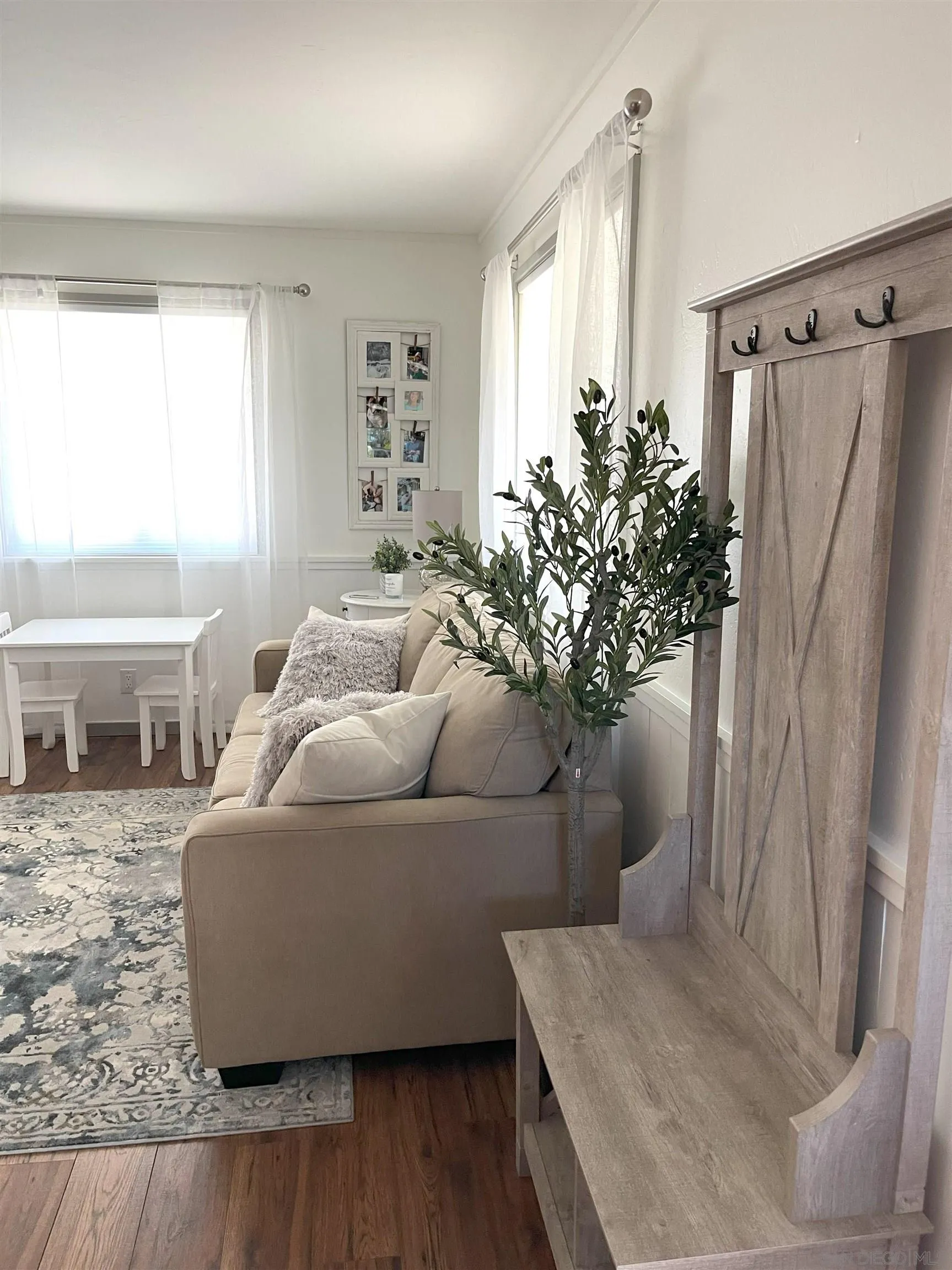 3208 Eagle Peak Road Julian, CA 92036 - Photo 54 of 65 a living room with furniture and a large window