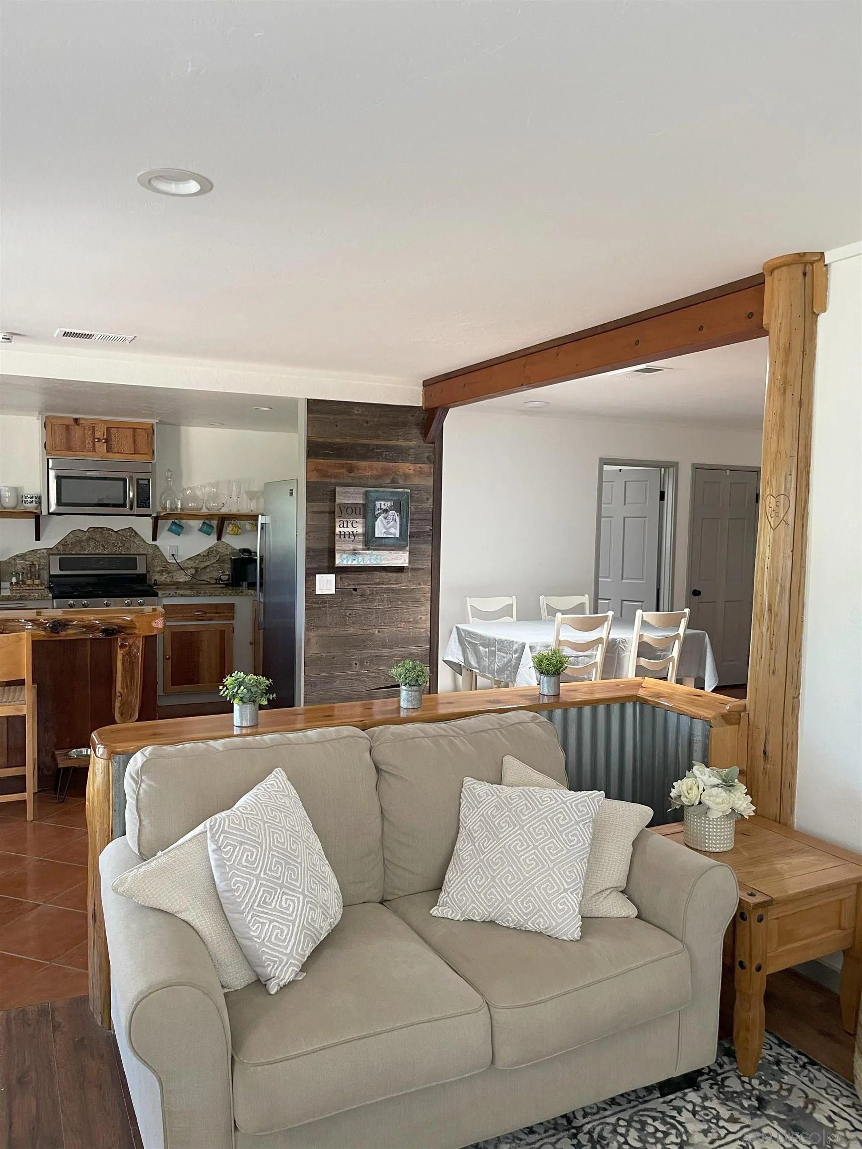 3208 Eagle Peak Road Julian, CA 92036 - Photo 56 of 65 a living room with furniture and a large window