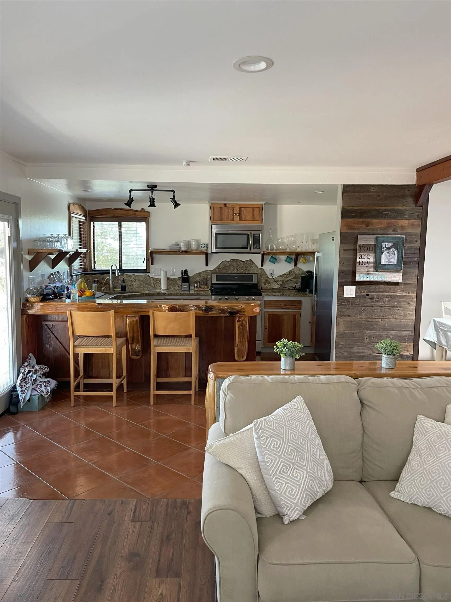 3208 Eagle Peak Road Julian, CA 92036 - Photo 57 of 65 a living room with furniture and view kitchen