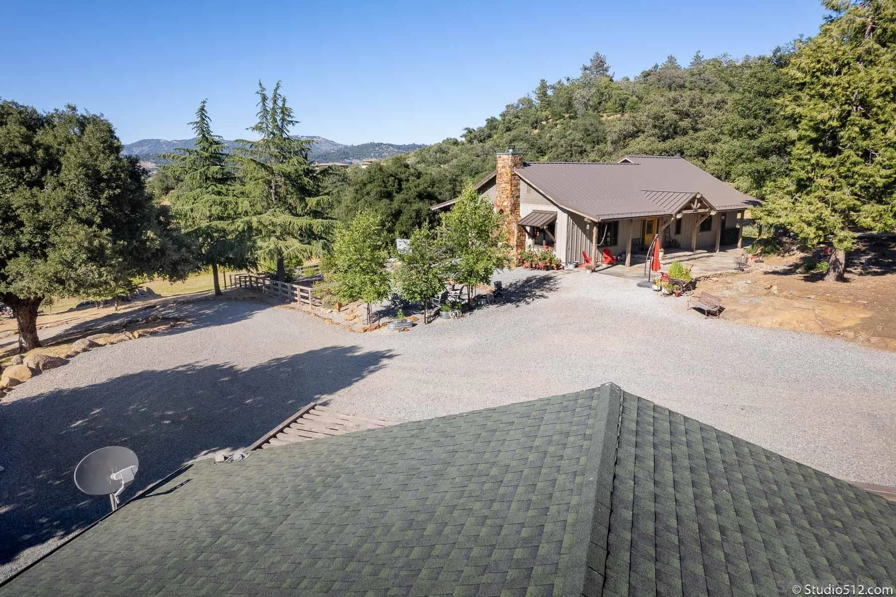 3208 Eagle Peak Road Julian, CA 92036 - Photo 8 of 65 a view of a patio with a table and chairs under an umbrella