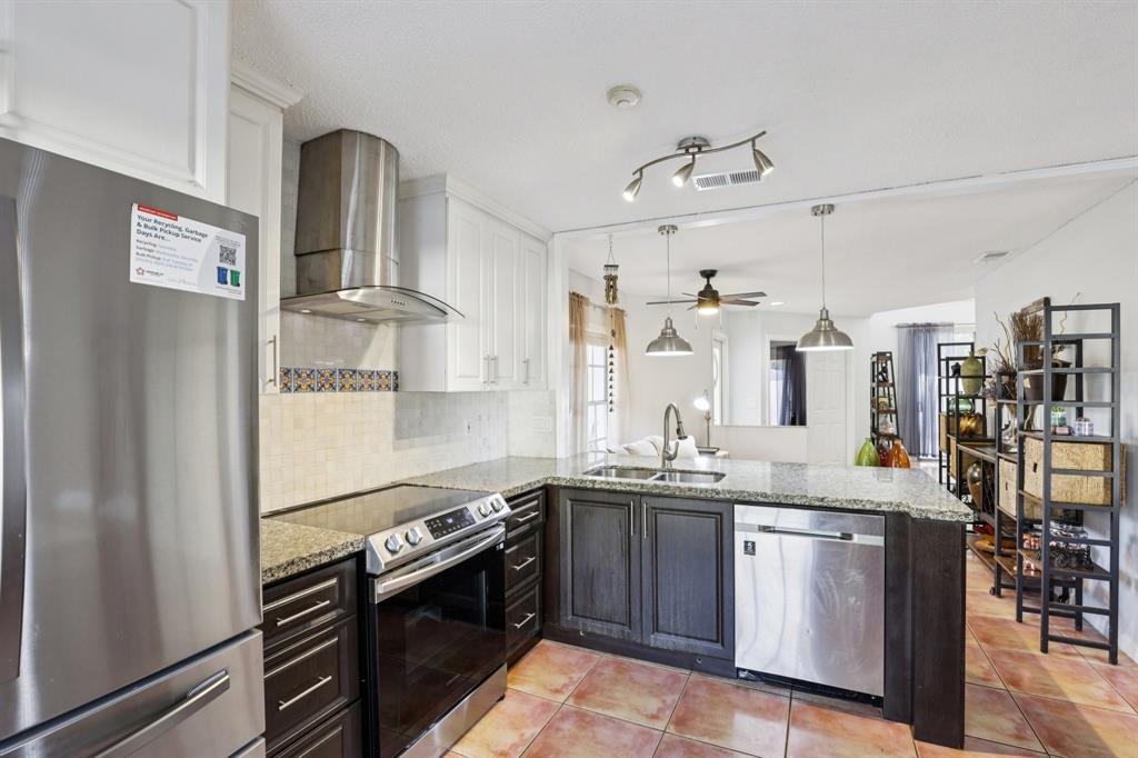 972 Azure Lane Weston, FL 33326 - Photo 16 of 61 Its layout supports efficient movement and creates a bright, welcoming space