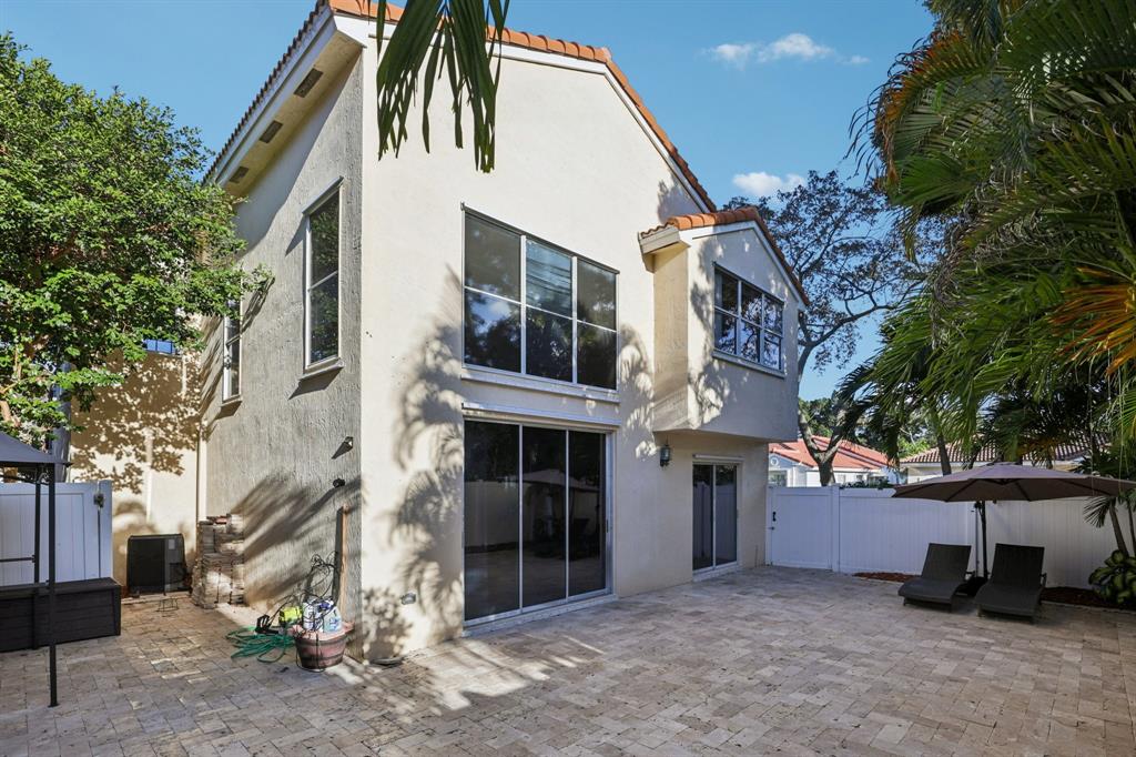 972 Azure Lane Weston, FL 33326 - Photo 2 of 61 a view of a house with a yard and sitting area