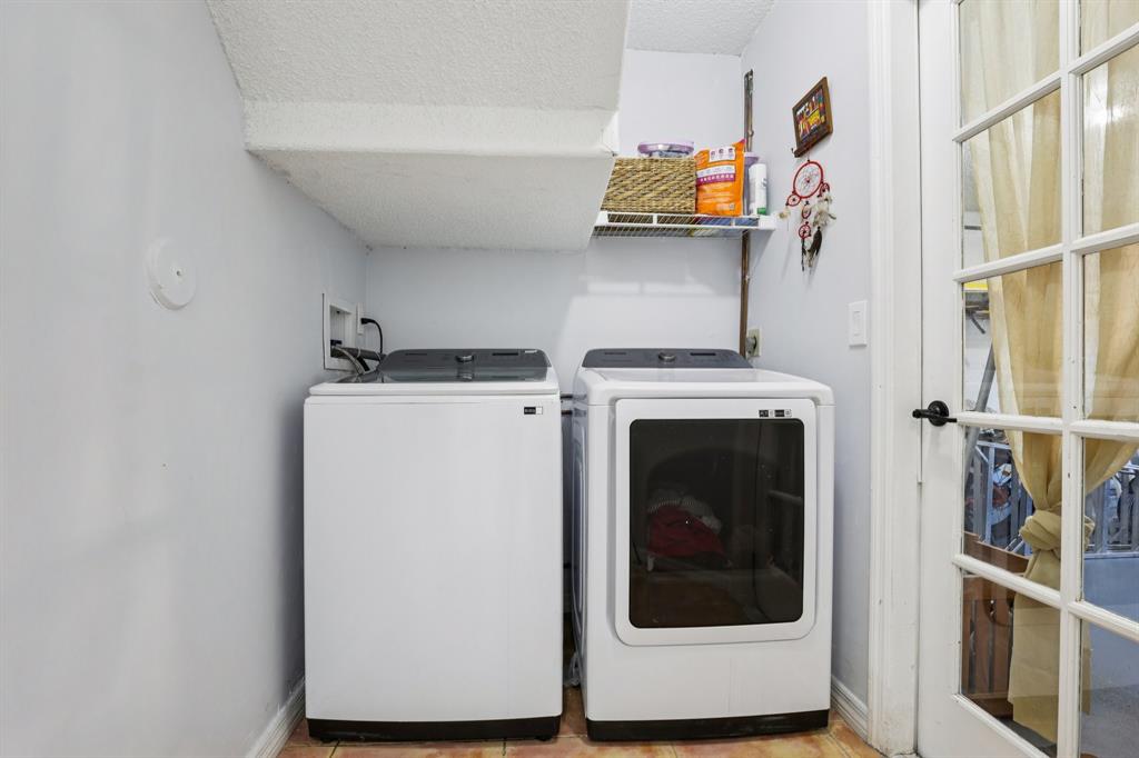972 Azure Lane Weston, FL 33326 - Photo 27 of 61 a utility room with dryer and washer