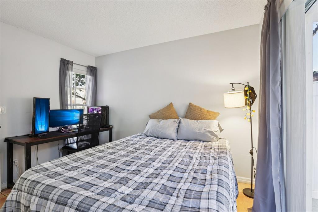 972 Azure Lane Weston, FL 33326 - Photo 30 of 61 This room adds flexibility and value to the overall layout.