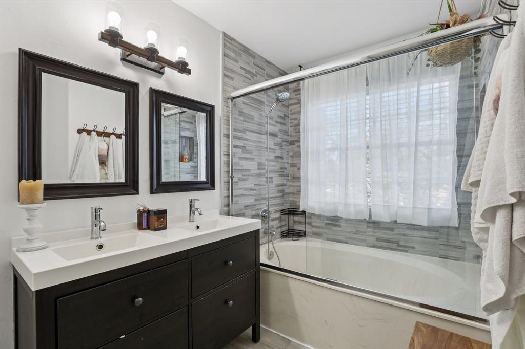 972 Azure Lane Weston, FL 33326 - Photo 5 of 61 a bathroom with a double vanity sink mirror and double