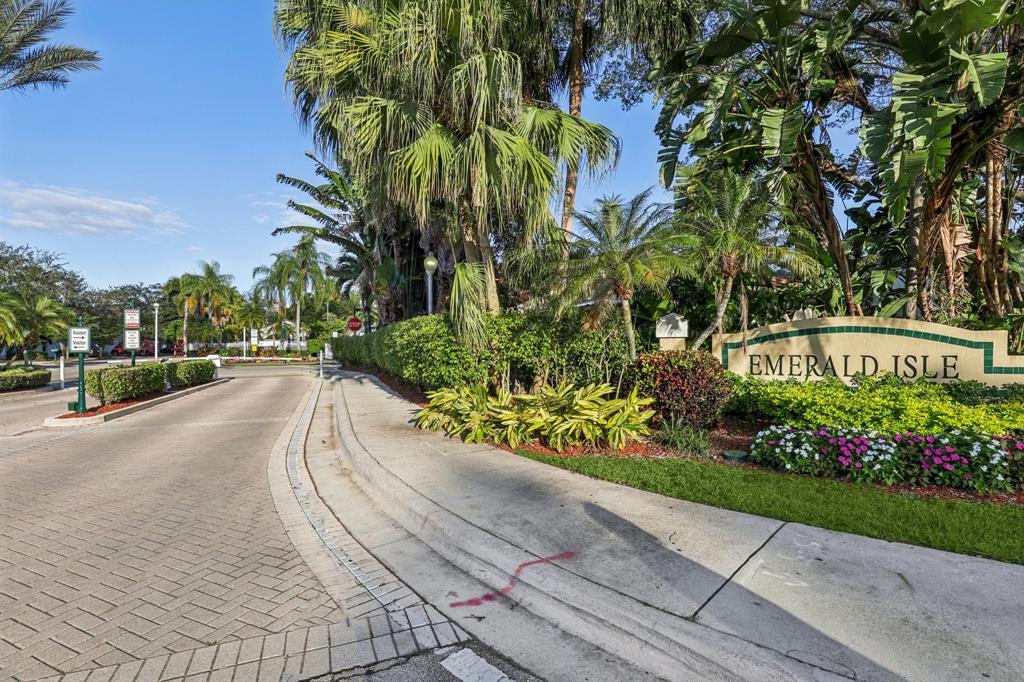 972 Azure Lane Weston, FL 33326 - Photo 60 of 61 a view of a garden with a pathway