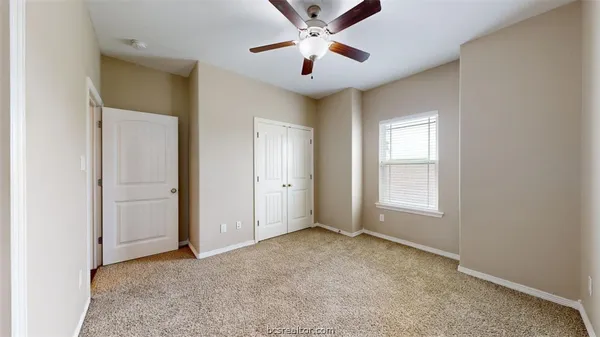 a view of backyard with green space