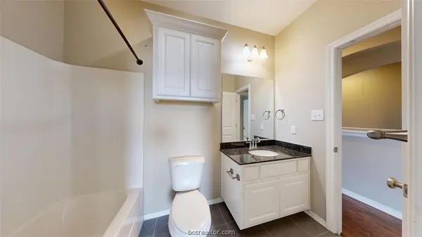 a view of a backyard with a garden