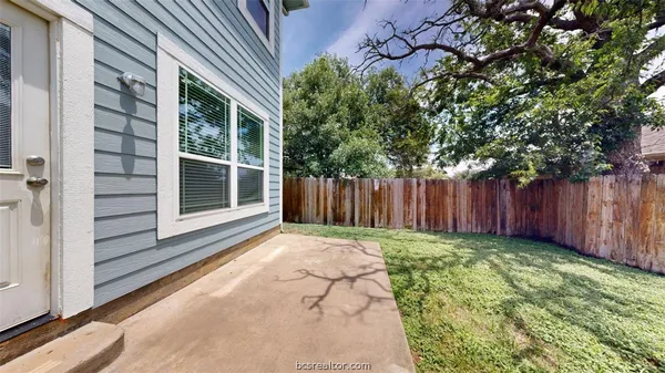 a view of a backyard with a garden