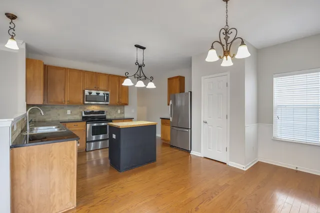 a view of kitchen and sink