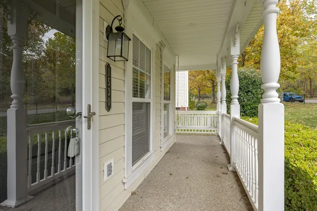 a view of a porch of a house