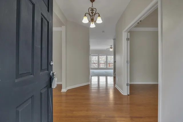 a view of entryway with wooden floor