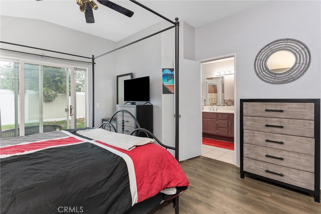 2165 Mintzer Street Colton, CA 92324 - Photo 16 of 40 a bedroom with a bed and a television