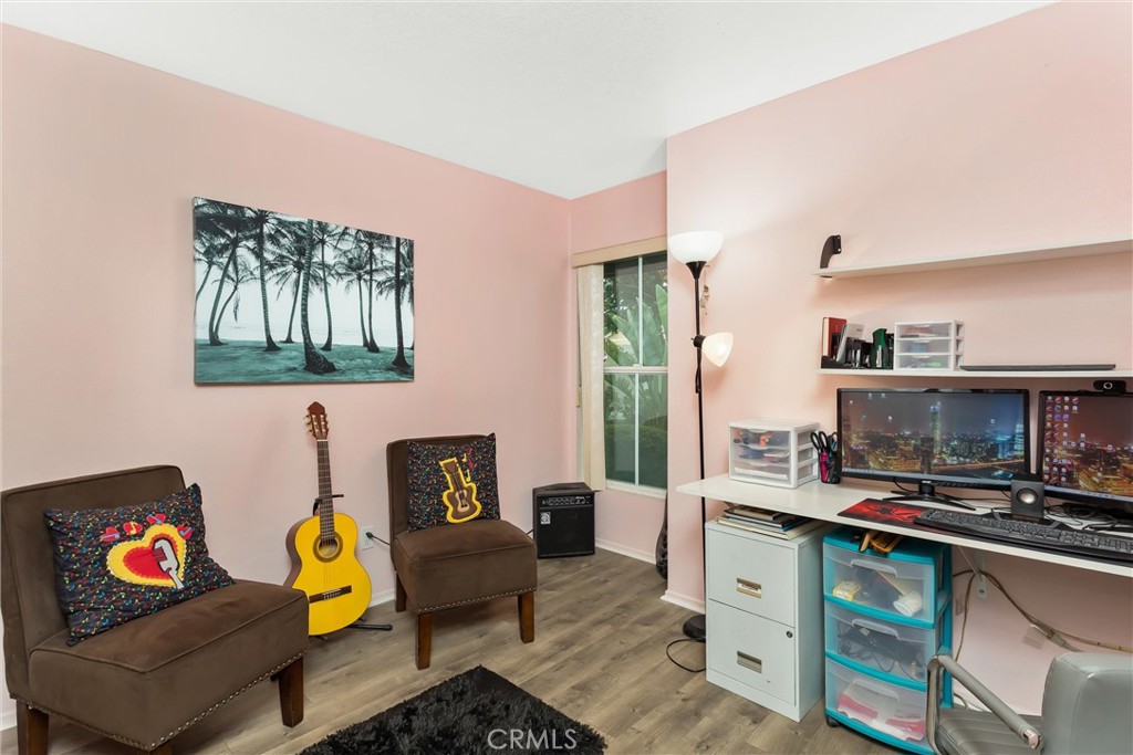 2165 Mintzer Street Colton, CA 92324 - Photo 22 of 40 a living room with furniture and a fireplace
