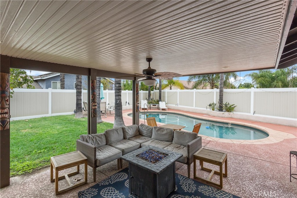 2165 Mintzer Street Colton, CA 92324 - Photo 30 of 40 a outdoor space with patio the couches and pool table and chairs with garden view