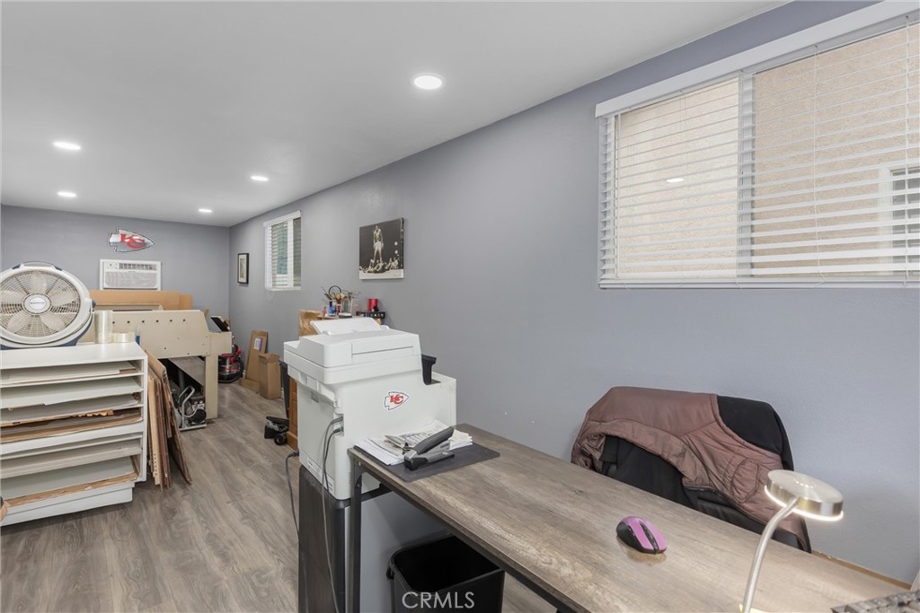 2165 Mintzer Street Colton, CA 92324 - Photo 33 of 40 a view of a workspace with furniture and a window