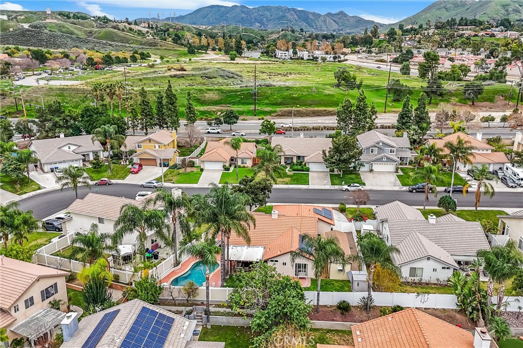 2165 Mintzer Street Colton, CA 92324 - Photo 38 of 40 an aerial view of residential houses with outdoor space and street view