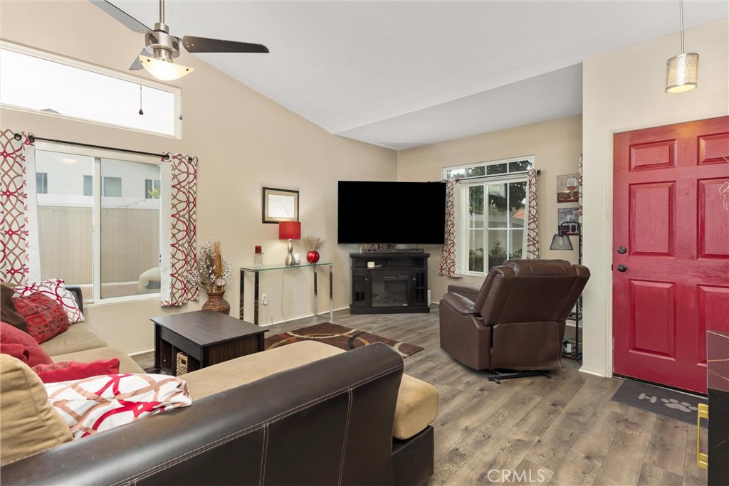 2165 Mintzer Street Colton, CA 92324 - Photo 5 of 40 a living room with furniture and a flat screen tv