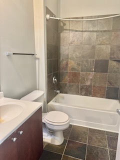 1464 South Michigan Avenue, Unit 1507 Chicago, IL 60605 - Photo 10 of 13 a bathroom with a toilet and a shower