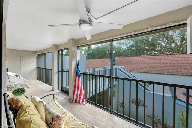 a view of balcony with furniture