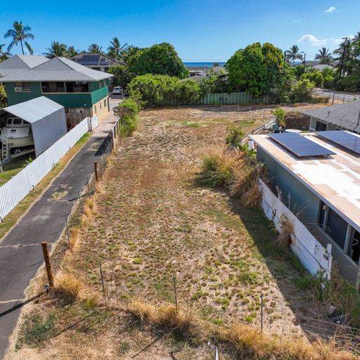 Elepaio Road Kekaha, HI 96752 - Photo 2 of 12 a view of a house with a yard