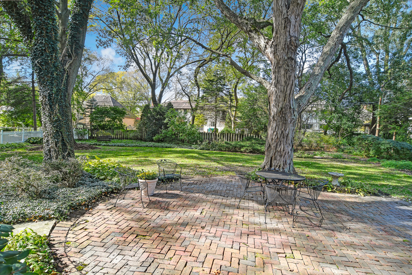 1124 Woodview Road Burr Ridge, IL 60527 - Photo 5 of 27 a view of a yard with a tree