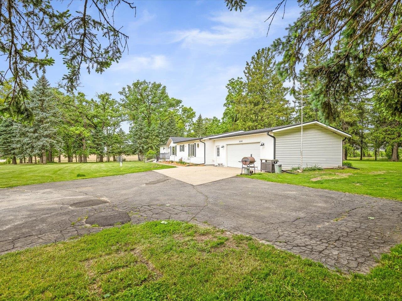 8500 Manchester Road Capron, IL 61012 - Photo 8 of 51 a front view of a house with garden