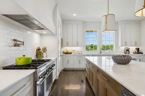 a bathroom with a sink vanity and a mirror