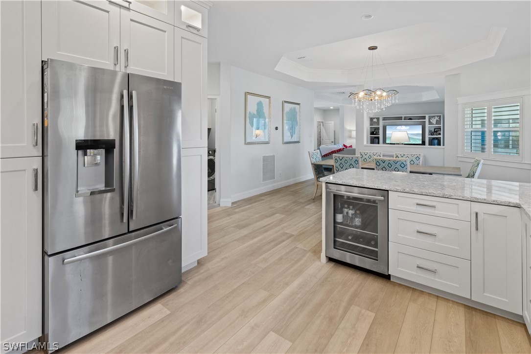5294 Umbrella Pool Road Sanibel, FL 33957 - Photo 15 of 44 a kitchen with stainless steel appliances a refrigerator and a stove