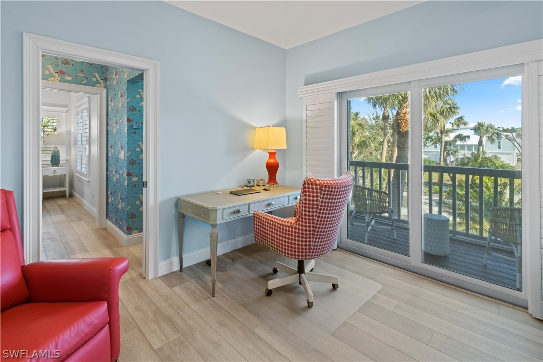 5294 Umbrella Pool Road Sanibel, FL 33957 - Photo 24 of 44 a living room with furniture and a window