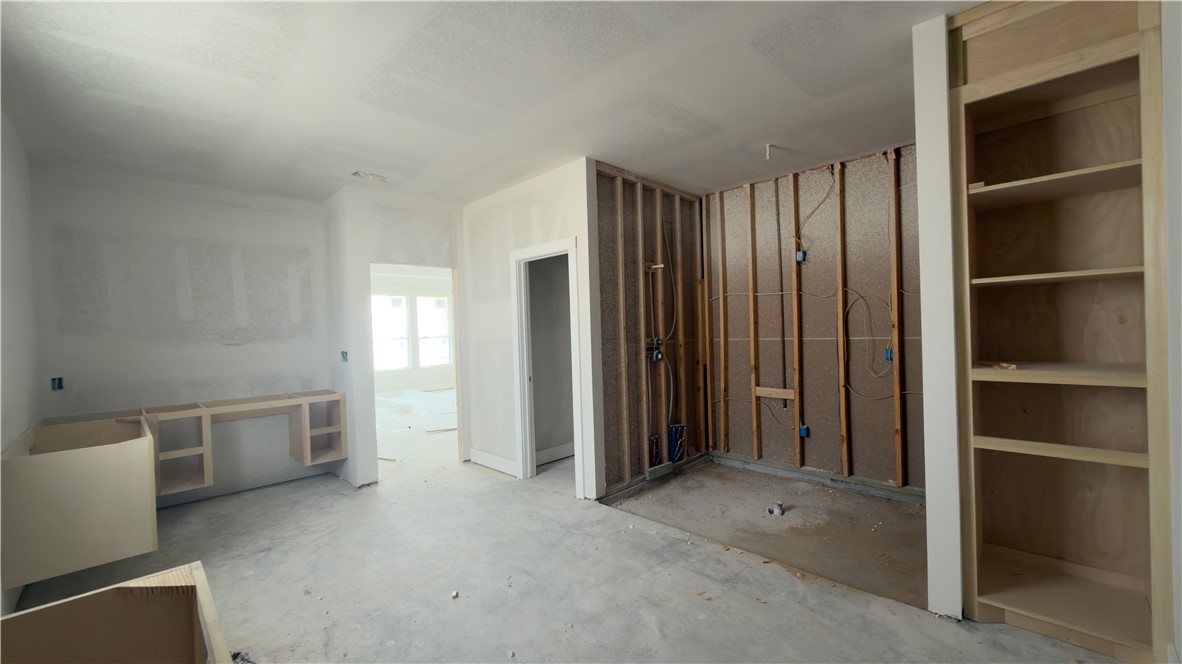 2602 Atlantic View Street Corpus Christi, TX 78415 - Photo 7 of 14 a view of an empty room with a fireplace and cabinet