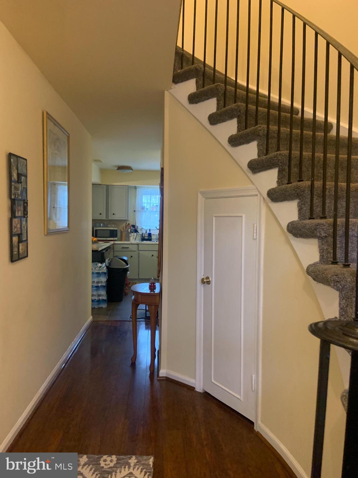 8210 Carrleigh Parkway, Unit 6 Springfield, VA 22152 - Photo 17 of 32 a view of entryway and hall with wooden floor