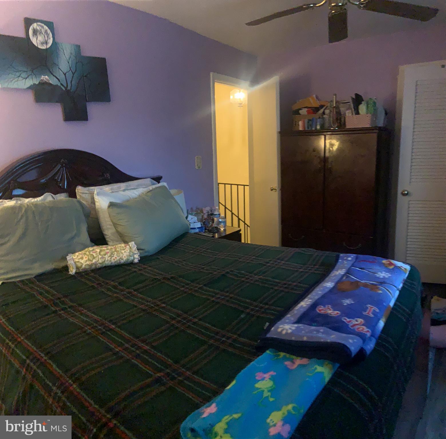 8210 Carrleigh Parkway, Unit 6 Springfield, VA 22152 - Photo 20 of 32 a bedroom with a bed and a closet