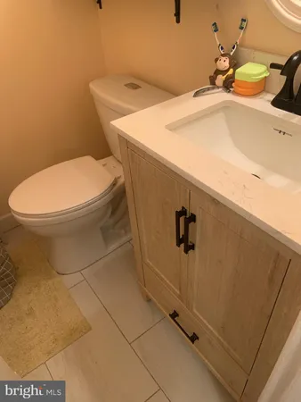 a bathroom with a sink and toilet