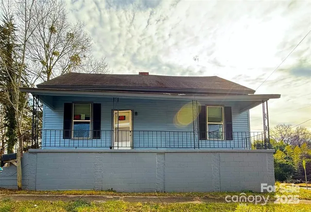 a view of a house with a swimming pool