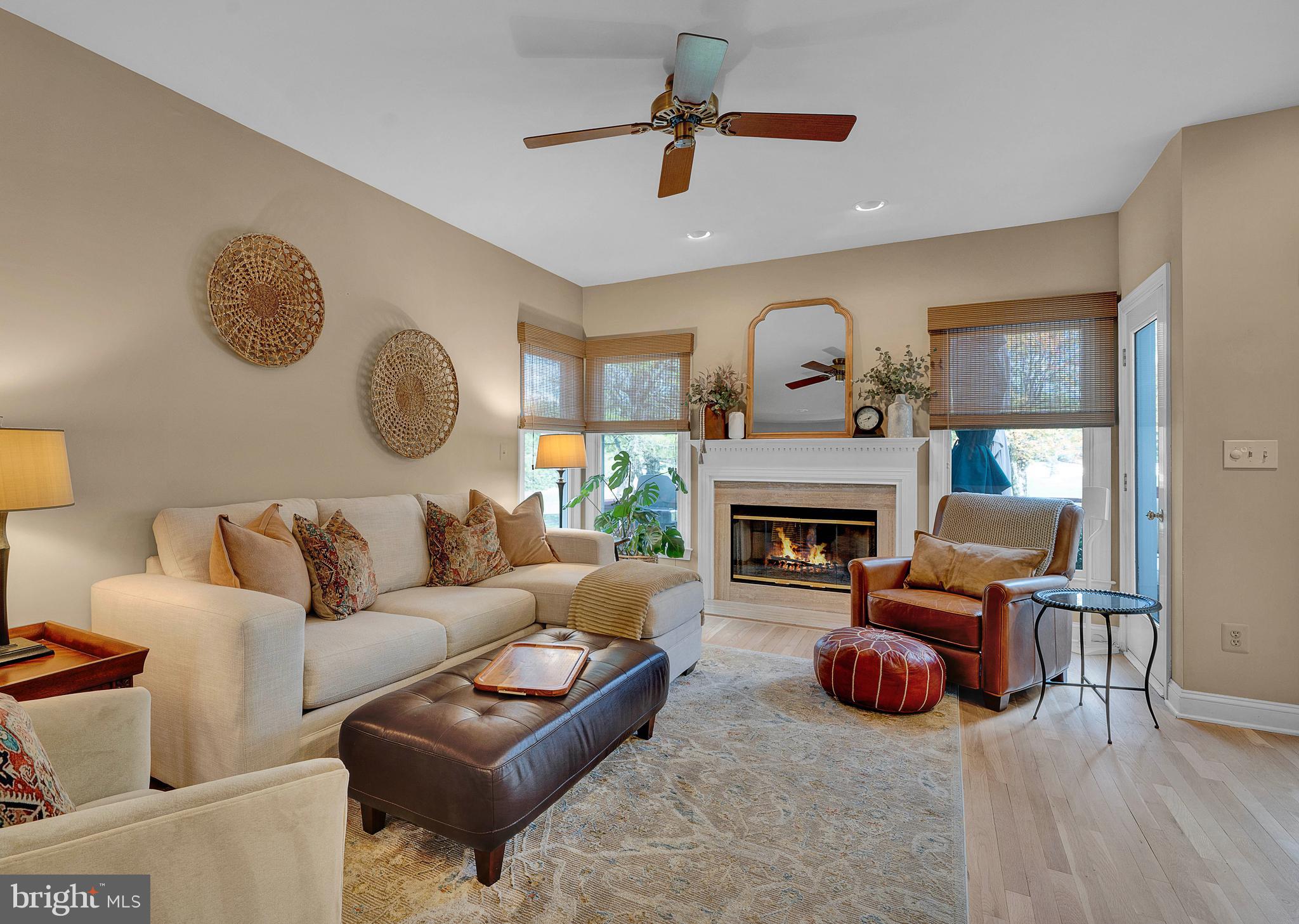 145 Sawgrass Drive Blue Bell, PA 19422 - Photo 11 of 61 a living room with furniture and a fireplace