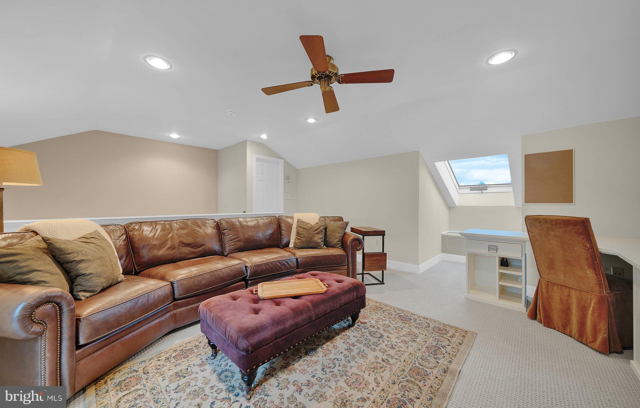 145 Sawgrass Drive Blue Bell, PA 19422 - Photo 24 of 61 a living room with furniture and a rug