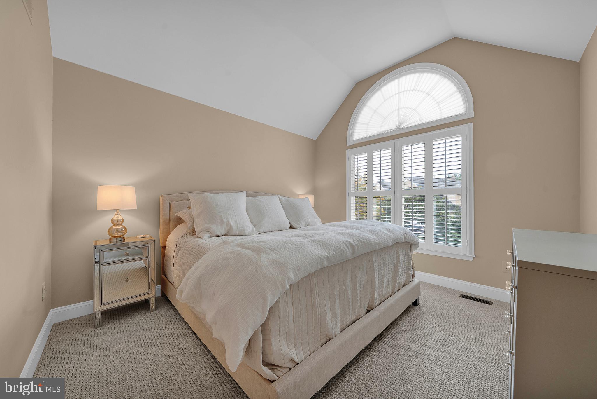 145 Sawgrass Drive Blue Bell, PA 19422 - Photo 29 of 61 a spacious bedroom with a bed and a window