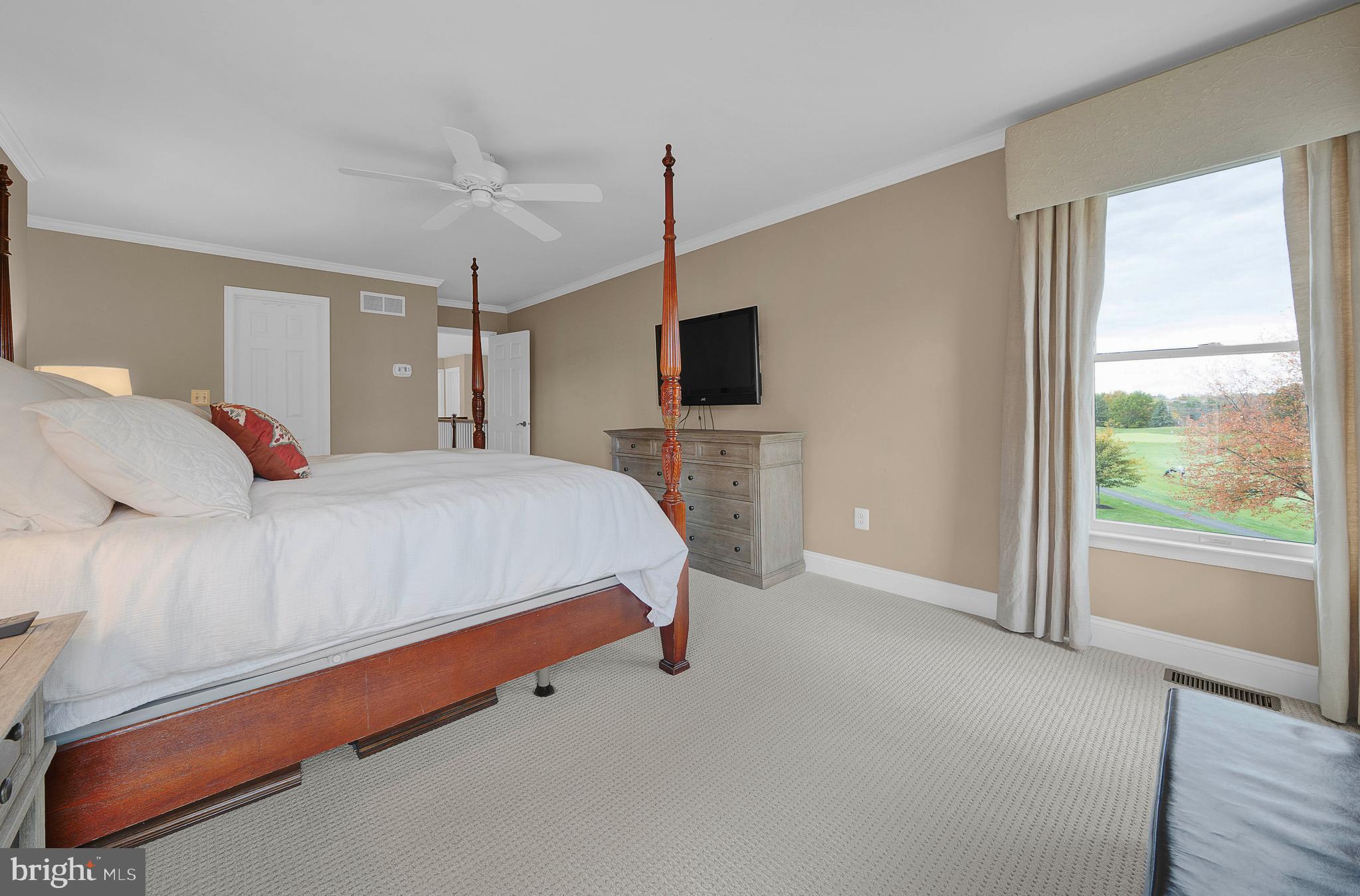 145 Sawgrass Drive Blue Bell, PA 19422 - Photo 37 of 61 a bedroom with a bed and a flat tv screen